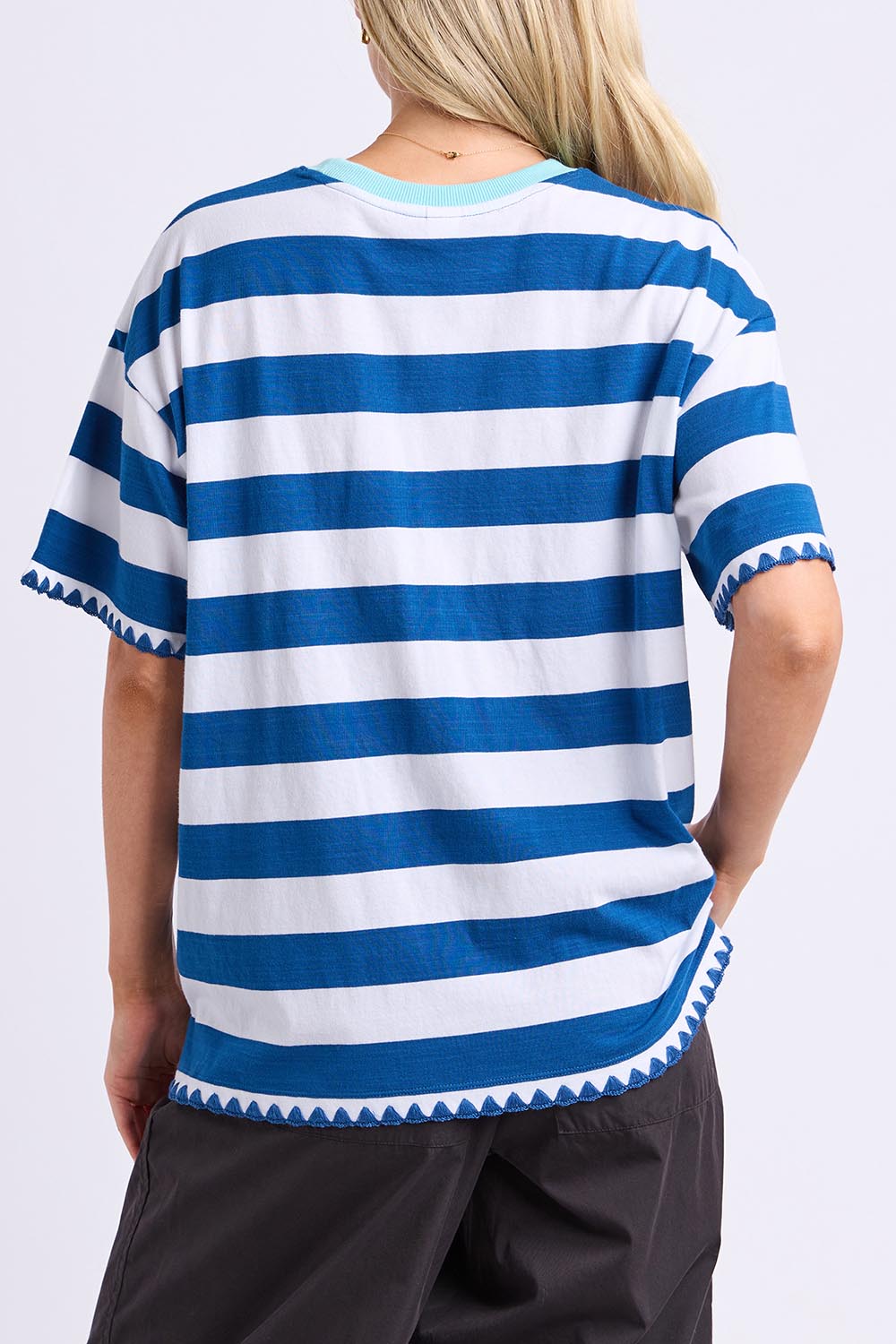 Model Genericm wearing size sample of the Cherry Cotton Tee – Chinablue in colour Chinablue, from the back