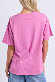 Model Genericm wearing size sample of the Rio Tee – Magenta in colour Magenta, from the back