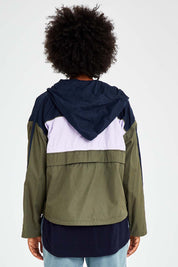 Model Olivia wearing size S of the Laura Spray Jacket in colour Khaki (Green), from the back