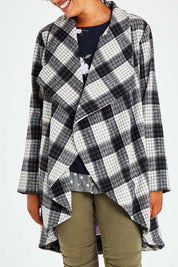 Model Olivia wearing size S of the Cindy Check Coat in colour Charcoal (Grey), from the front, cropped image