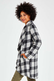 Model Olivia wearing size S of the Cindy Check Coat in colour Charcoal (Grey), from the front, cropped image
