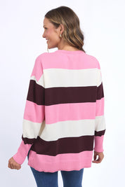 A model wearing the Hallie Stripe Knit in colour Pinkmarsh, from the back