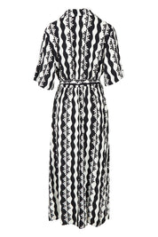 Product shot of the Casa Dress in colour Blackmarsh (Black), from the back