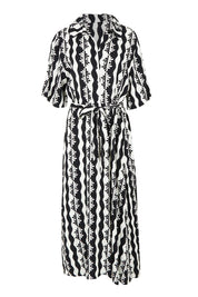Product shot of the Casa Dress in colour Blackmarsh (Black), from the front