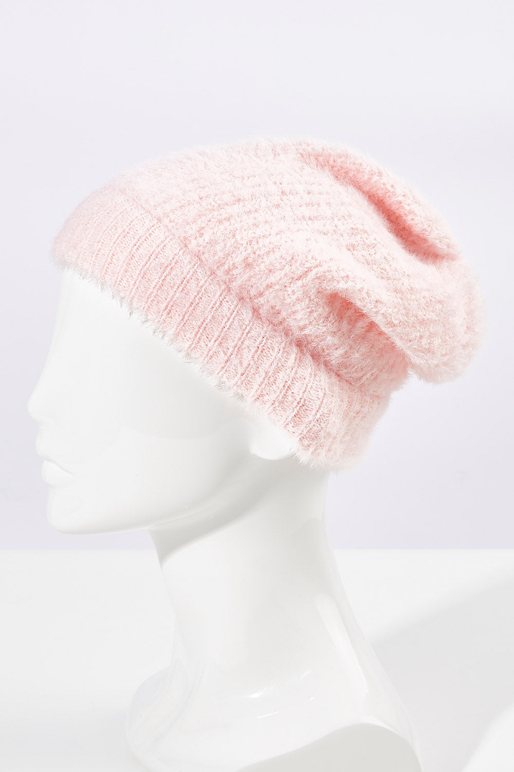 A model wearing size OneSize of the Snug Beanie in colour Peonypink (Pink), from the front, showing the whole outfit
