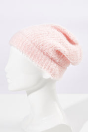 A model wearing size OneSize of the Snug Beanie in colour Peonypink (Pink), from the front, showing the whole outfit