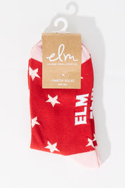 A model wearing size OneSize of the Star Ankle Socks in colour Pinkstar (Pink), from the front, showing the whole outfit