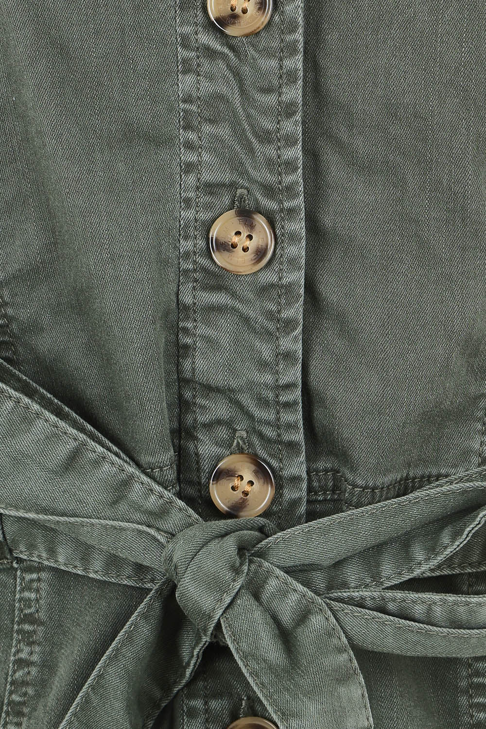 Product shot of the Marigold Denim Dress in colour Clover (Green), detail