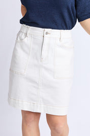 A model wearing the Atlas Denim Skirt in colour Vintwhite (White), from the front, cropped image