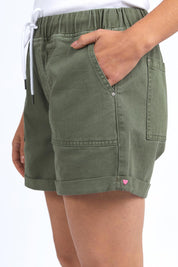 Model Genericm wearing size sample of the Fundamental Emma Relaxed Denim Short – Clover in colour Clover, from an angle