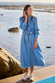 Model Alex wearing size 10 of the Lucinda Denim Shirt Dress in colour Denim (Blue), from the front, showing the whole outfit