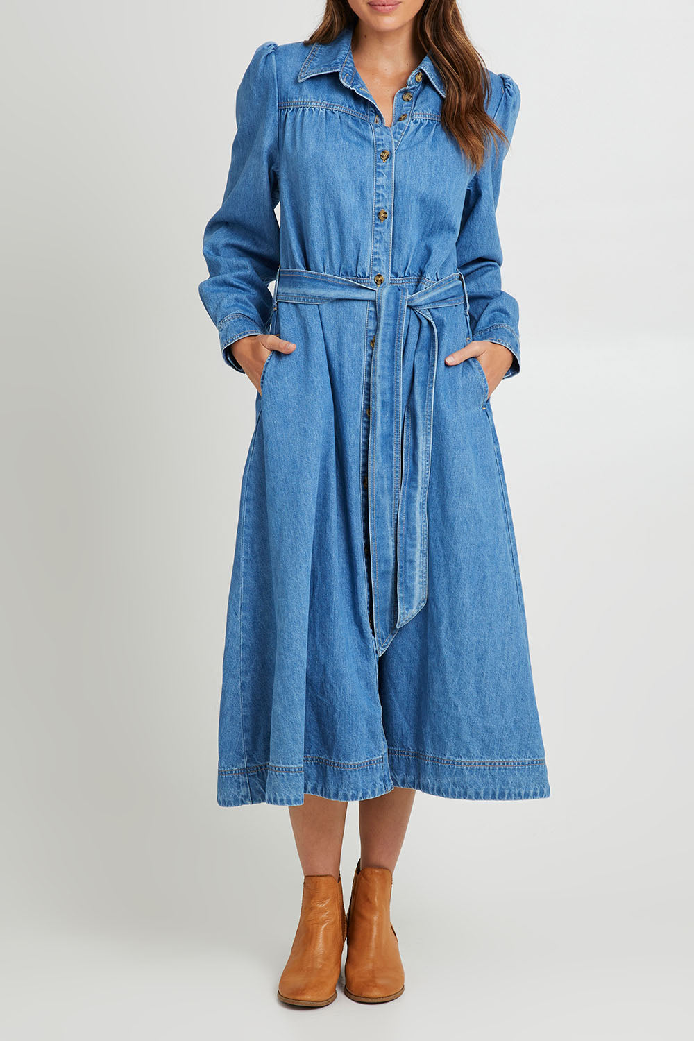 Model Madeline wearing size 10 of the Lucinda Denim Shirt Dress in colour Denim (Blue), from the front, cropped image