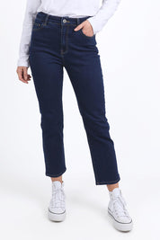 A model wearing the Ada Straight Leg Jean in colour Darkblue (Blue), from the front, cropped image