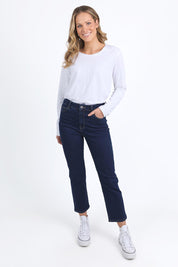 A model wearing the Ada Straight Leg Jean in colour Darkblue (Blue), from the front, showing the whole outfit