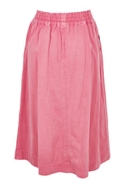 Product shot of the Greta Denim Skirt in colour Chateauros (Pink), from the back
