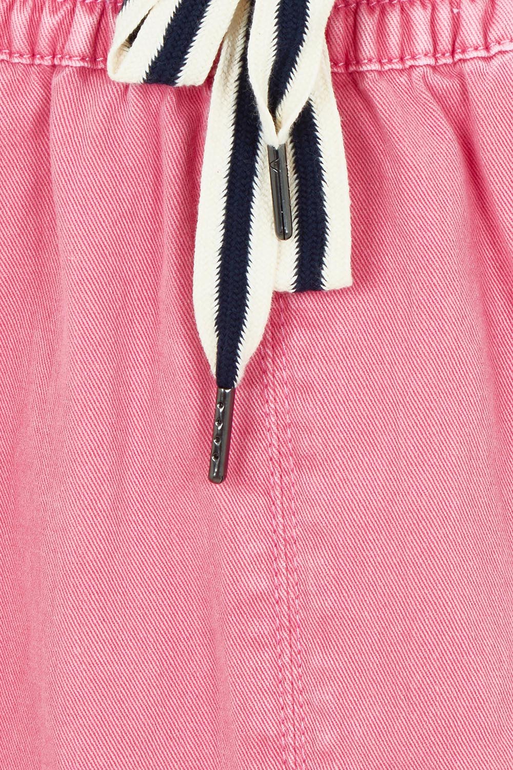 Product shot of the Greta Denim Skirt in colour Chateauros (Pink), detail