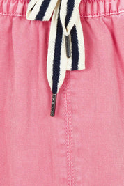 Product shot of the Greta Denim Skirt in colour Chateauros (Pink), detail