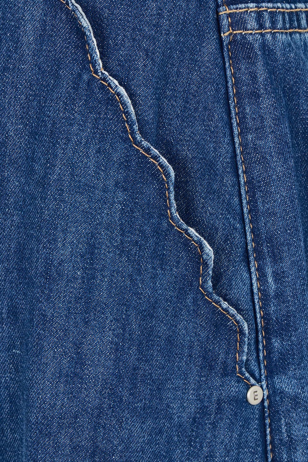 Product shot of the Scallop Edge Denim Skirt in colour Midblue (Blue), detail