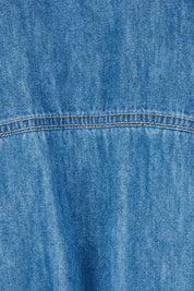 Product shot of the River Denim Dress in colour Midblue (Blue), detail