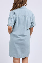 A model wearing the Jenna Stripe Denim Dress in colour Bluewhite (Blue), from the back