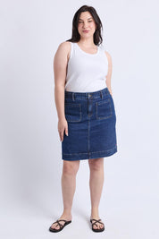A model wearing the Lennox Denim Skirt in colour Drkblue (Blue), from the front, showing the whole outfit