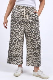 A model wearing the Animal Elastic Waist Pant in colour Animal, from the front, cropped image