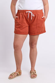 Model Genericm wearing size sample of the Fundamental Emma Relaxed Denim Short – Earthbrown in colour Earthbrown, from the front