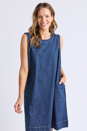 A model wearing the Sonny Denim Dress in colour Darkblue (Blue), from the front, cropped image