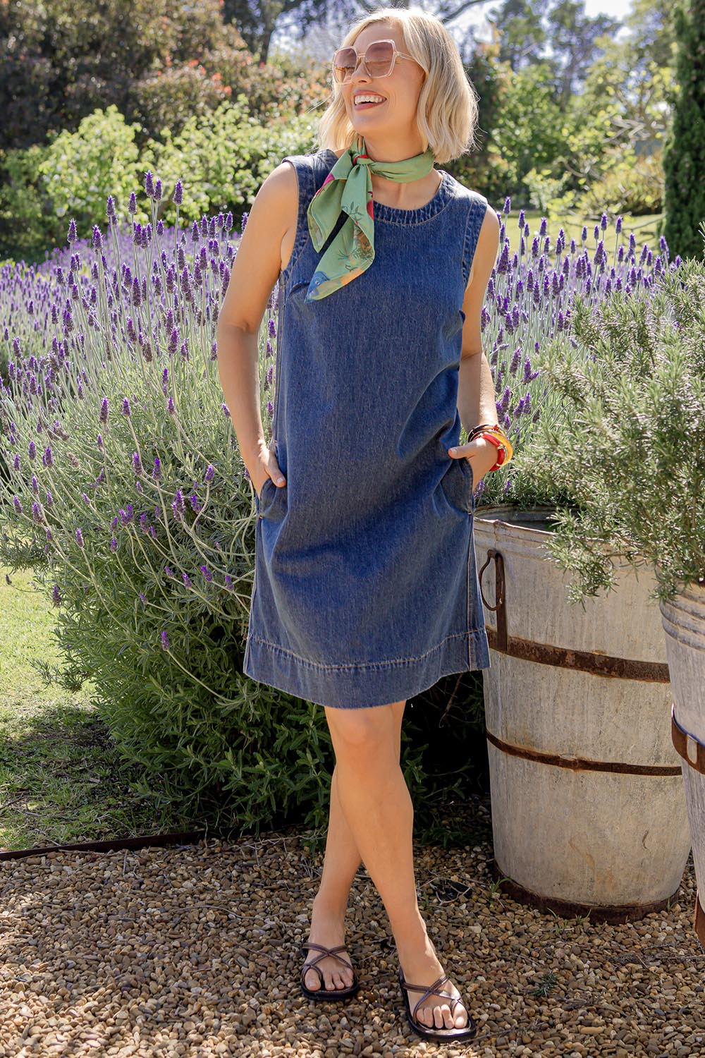 A model wearing the Sonny Denim Dress in colour Darkblue (Blue), from the front, showing the whole outfit