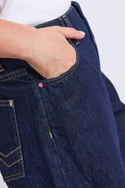 Model Genericm wearing size sample of the Faith Denim Shorts – Dblue in colour Dblue, in a cropped view