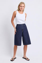 Model Genericm wearing size sample of the Faith Denim Shorts – Dblue in colour Dblue, from the front