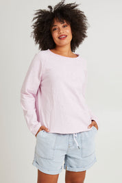 Model Olivia wearing size 10 of the Fundamental Emma Relaxed Short in colour Lghtblue (Blue), from the front, cropped image