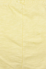 Product shot of the Fundamental Brunch Cotton Pant in colour Banana, detail