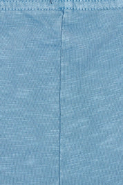 Product shot of the Fundamental Brunch Cotton Pant in colour Blueshadow (Blue), detail