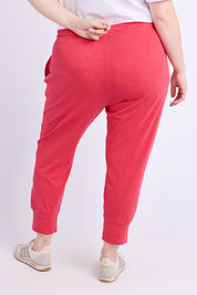 Model Genericm wearing size sample of the Fundamental Brunch Pant – Darkpink in colour Darkpink, from the back