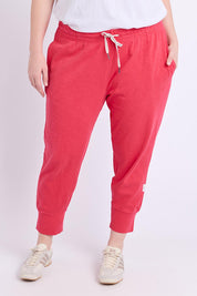 Model Genericm wearing size sample of the Fundamental Brunch Pant – Darkpink in colour Darkpink, in a cropped view