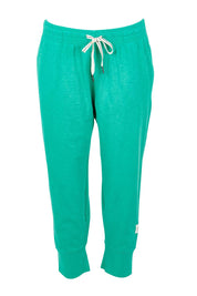Product shot of the Fundamental Brunch Cotton Pant in colour Gumdrop (Green), from the front