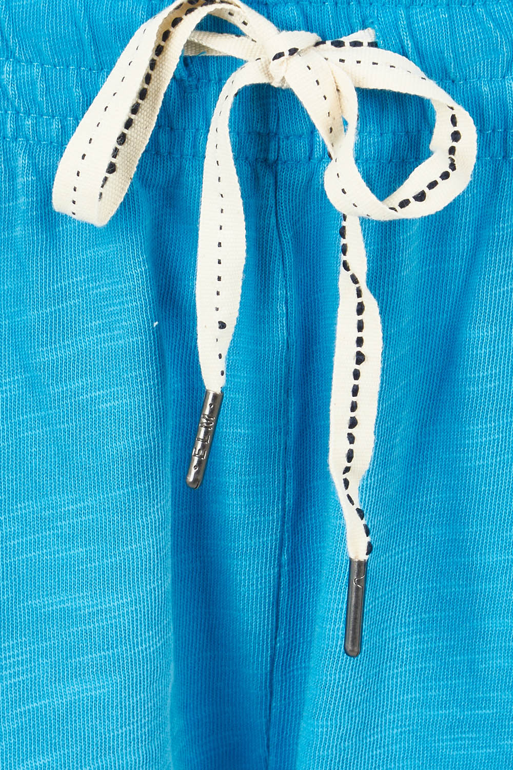 Product shot of the Fundamental Brunch Cotton Pant in colour Ibizablue (Blue), detail