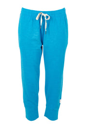 Product shot of the Fundamental Brunch Cotton Pant in colour Ibizablue (Blue), from the front
