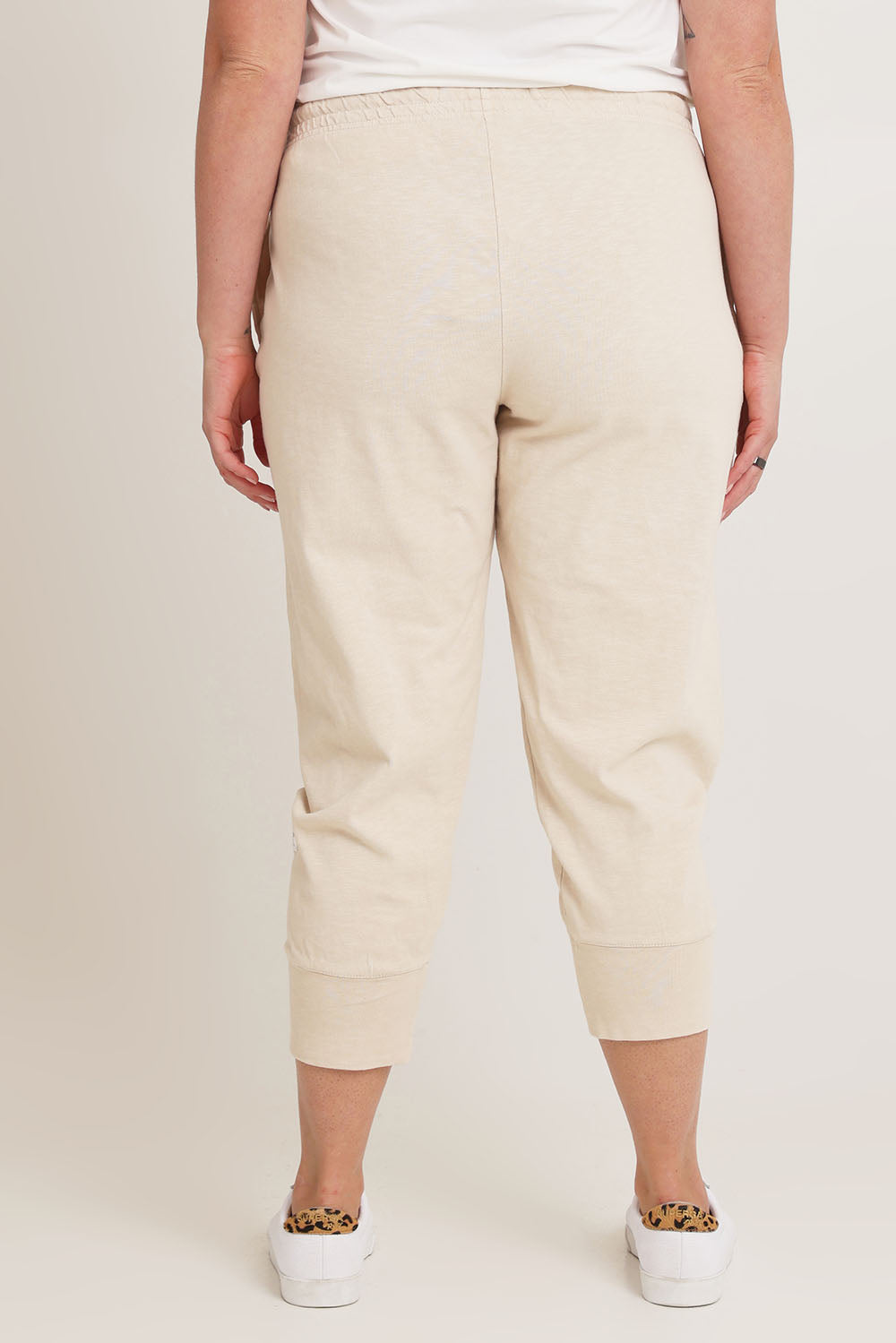 Model Chanel wearing size 16 of the Fundamental Brunch Cotton Pant in colour Linen, from the back