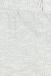 Product shot of the Fundamental Brunch Cotton Pant in colour Linen, from the front