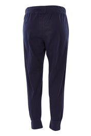 Product shot of the Fundamental Brunch Cotton Pant in colour Navy (Blue), from the back