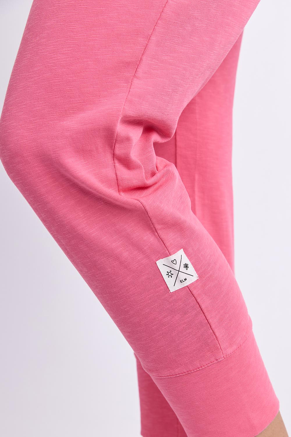 Model Genericm wearing size sample of the Fundamental Brunch Cotton Pant – Pinklemon in colour Pinklemon, from an angle