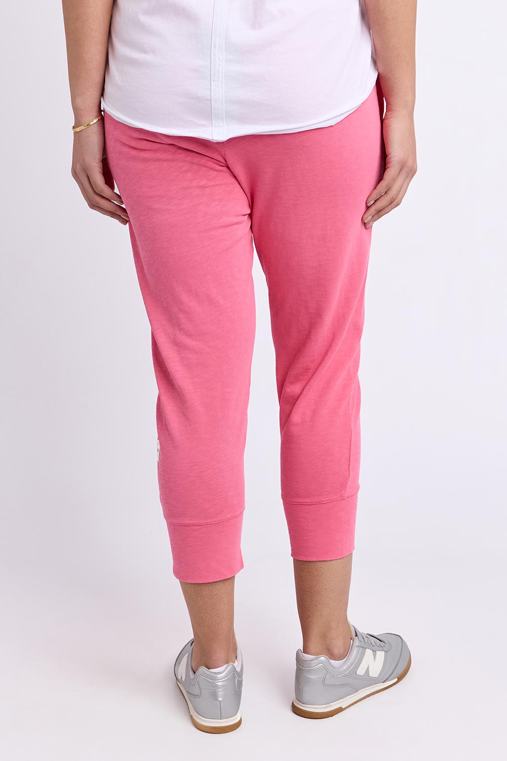 Model Genericm wearing size sample of the Fundamental Brunch Cotton Pant – Pinklemon in colour Pinklemon, from the back