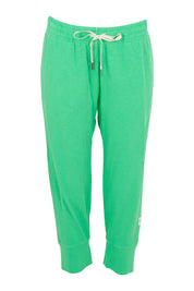 Product shot of the Fundamental Brunch Cotton Pant in colour Springgree (Green), from the front