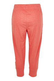 Product shot of the Fundamental Brunch Cotton Pant in colour Sugarcoral (Pink), from the back
