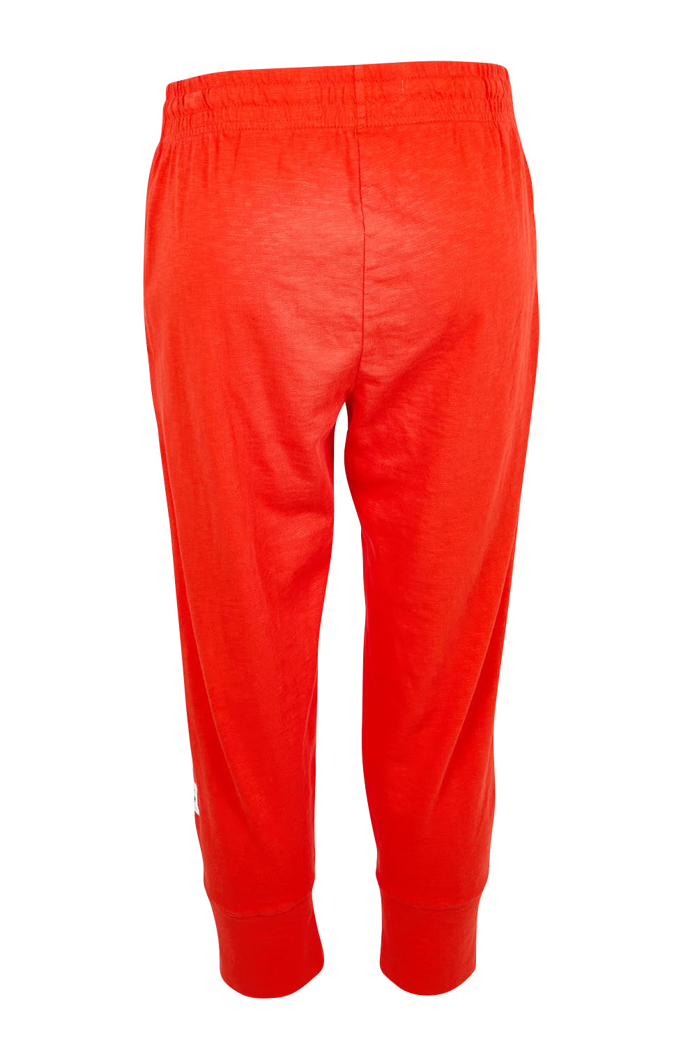Product shot of the Fundamental Brunch Cotton Pant – Tangello in colour Tangello, from the back
