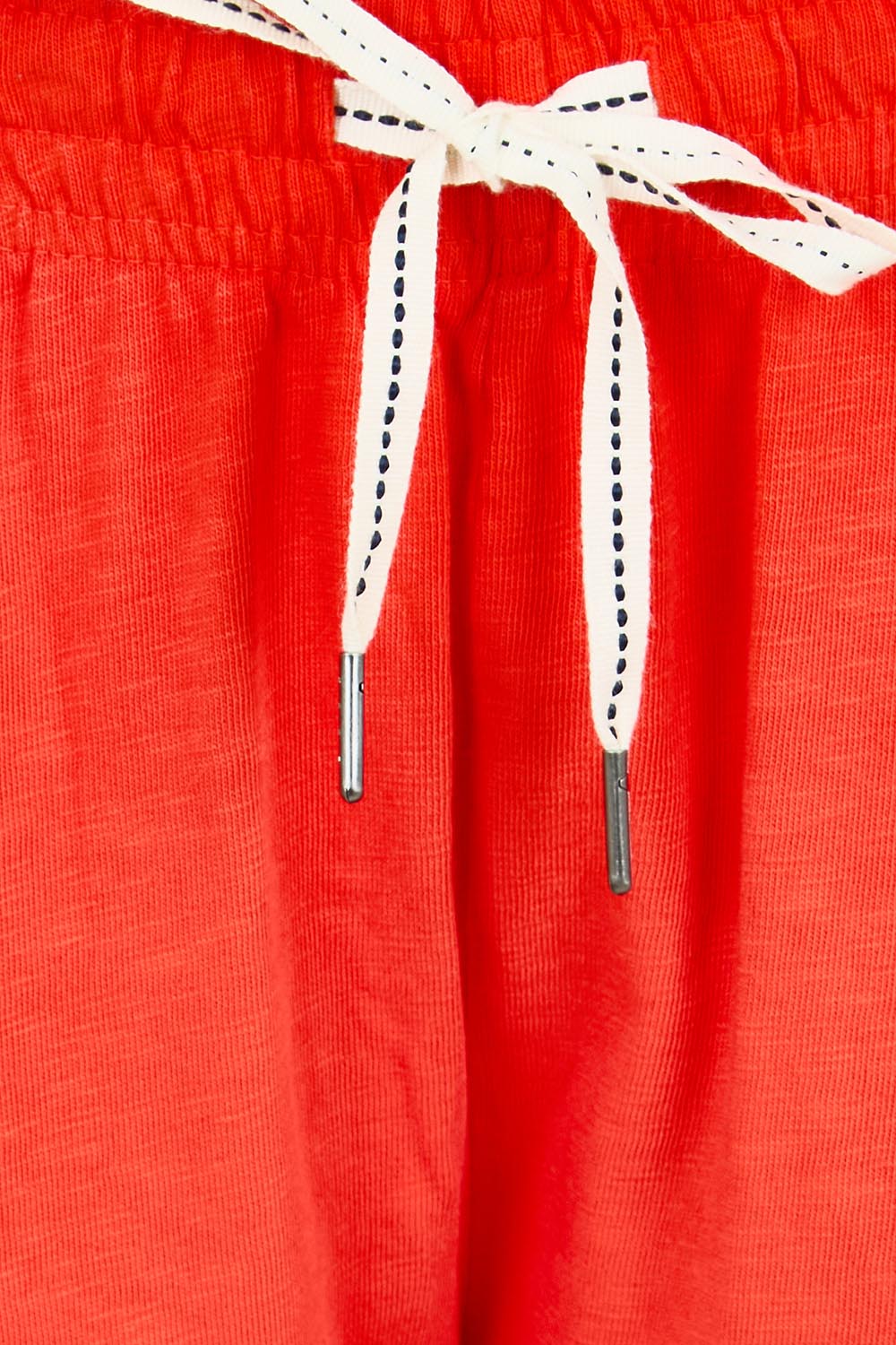 Product shot of the Fundamental Brunch Cotton Pant – Tangello in colour Tangello, showing detail