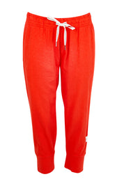 Product shot of the Fundamental Brunch Cotton Pant – Tangello in colour Tangello, from the front