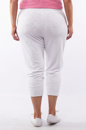 A model wearing the Fundamental Brunch Cotton Pant in colour White (White), from the back